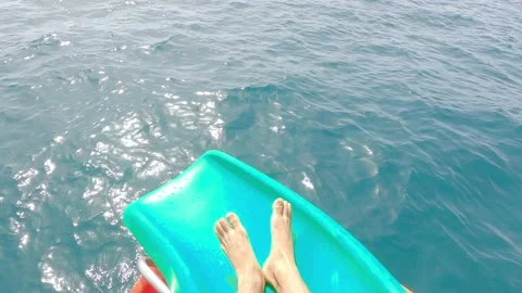 Portrait of one young man falling and sliding to the water with eyes closed enjo Stock Footage 171895593