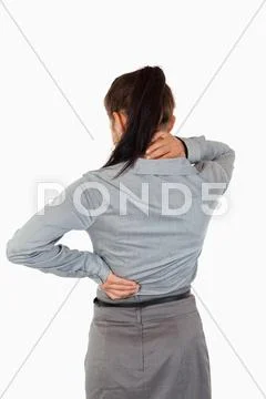 Portrait of the painful back of a businesswoman Stock Photos