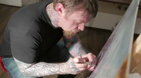 Portrait of painter airbrusher in art studio Stock Footage 59779325