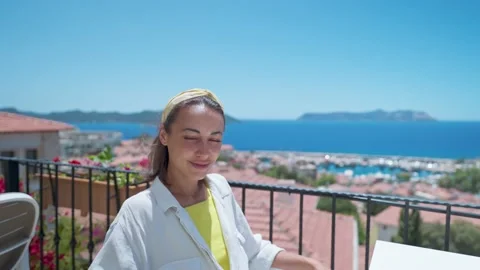 Portrait with parallax effect of young mixed race smiling woman sitting on open Stock-Footage 171874046