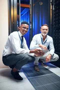 Portrait, people and programming with tablet in server room for research, coding Stock-Fotos