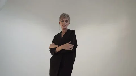 Portrait photo model posing in studio | Stock Video | Pond5