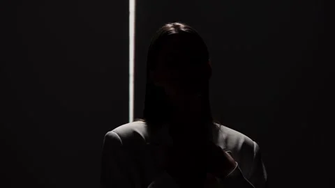 Portrait Photography with Dramatic Shadows and Light Beam Stock Footage 310497936