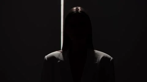 Portrait Photography with Dramatic Shadows and Light Beam Stock Footage 310497938