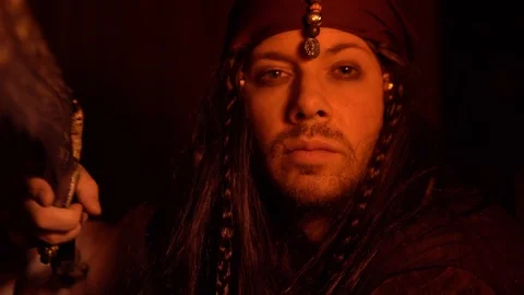 Portrait Of A Pirate Looking At Camera In Slow Motion, Dark And Mysterious Stock Footage 95596845