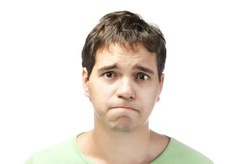 Portrait of pitiful young man isolated on white background Stock Photos