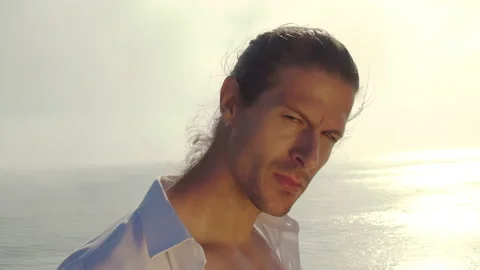 Portrait plan of a model of a man in a white shirt with sunglasses  Video stock 168167784