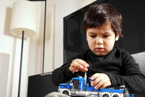 Portrait of a playing little boy Stock Photos