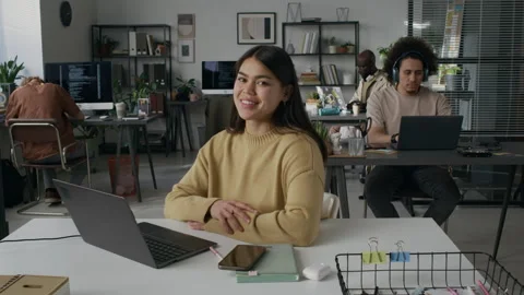 Portrait of Positive Young Woman Programming on Laptop at Workplace Video stock 299301351
