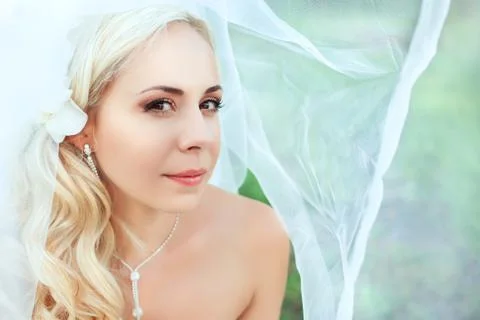 Portrait of pretty bride looking at camera Stock Photos