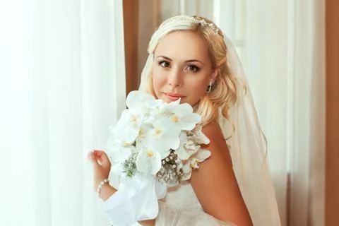 Portrait of pretty bride looking at camera Stock Photos