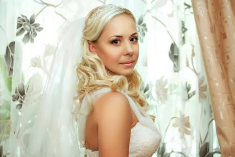 Portrait of pretty bride looking at camera Stock Photos