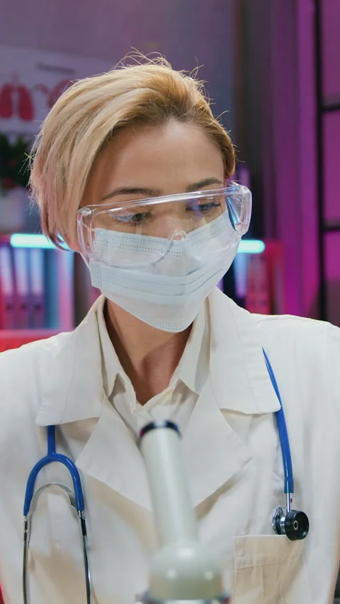 Portrait of pretty confident experienced observant blond female researcher biolo Stock Footage 331604211