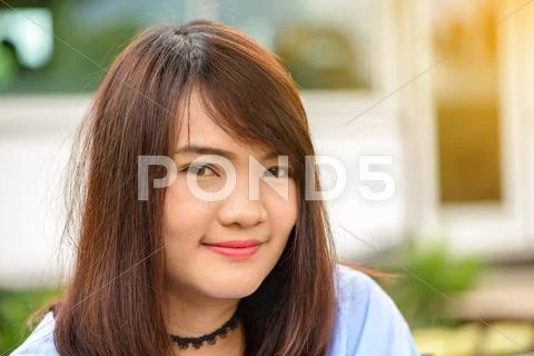 Portrait of a pretty happy woman, smiling Stock Photos
