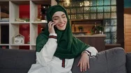 Portrait Of Pretty Middle Eastern Arab Woman In Hijab Talking On Mobile Phone On Stock Footage