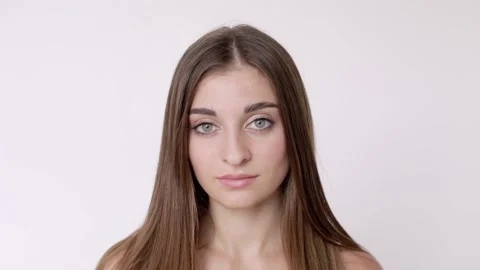 Portrait of a pretty young Middle Eastern model with bare shoulders. The model Stock Footage 228651342