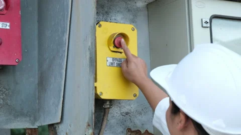 Portrait of professional Asian electrical engineer turning on the switches. Stock Footage 229705587
