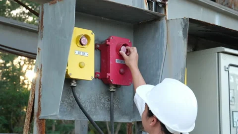 Portrait of professional Asian electrical engineer turning on the switches. Stock Footage 229706251