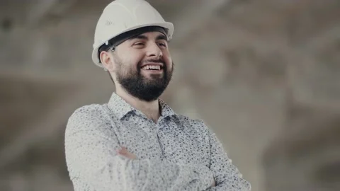 Portrait of a professional builder engineer. Worker wearing safety helmet Video stock 130794489