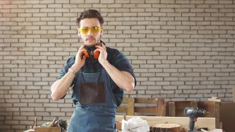 Portrait of a Professional Carpenter in His Workshop. Stock Photos