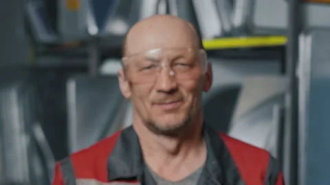 Portrait of a professional engineer in goggles and uniform. Caucasian working Stock-Footage 137263027
