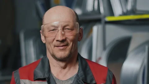Portrait of a professional engineer in goggles and uniform. Caucasian working Stock-Footage 137266114