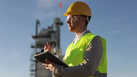 Portrait of professional engineer, a heavy industry worker, an inspector dressed Stock Footage 227782035