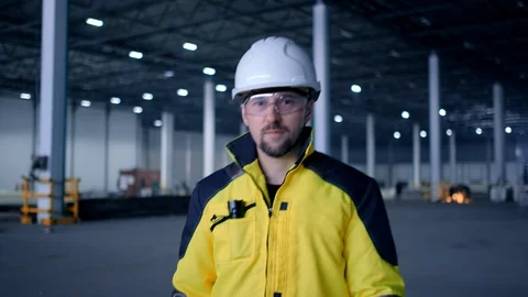 Portrait of Professional Heavy Industry Engineer / Worker Wearing Safety Uniform Stock Footage 127943546