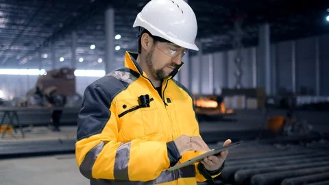 Portrait of Professional Heavy Industry Engineer / Worker Wearing Safety Uniform Stock Footage 127944060