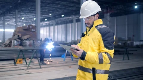 Portrait of Professional Heavy Industry Engineer / Worker Wearing Safety Uniform Stock Footage 127944229