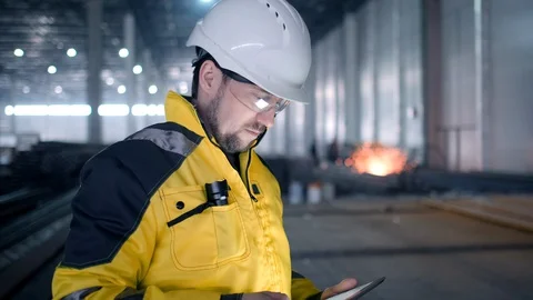 Portrait of Professional Heavy Industry Engineer / Worker Wearing Safety Uniform Stock Footage 127945022