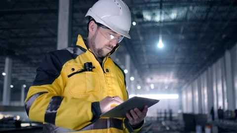 Portrait of Professional Heavy Industry Engineer / Worker Wearing Safety Uniform Stock Footage 127945222