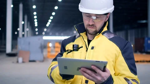 Portrait of Professional Heavy Industry Engineer / Worker Wearing Safety Uniform Stock Footage 127945443