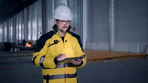 Portrait of Professional Heavy Industry Engineer / Worker Wearing Safety Uniform Stock Footage 127945461