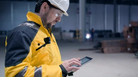 Portrait of Professional Heavy Industry Engineer / Worker Wearing Safety Uniform Stock Footage 128616732
