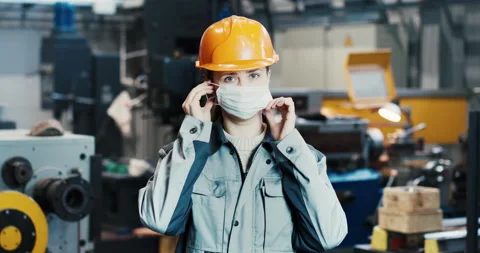 Portrait of a professional heavy industry engineer in protective uniform and Stock Footage 169098247