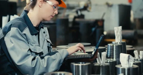 Portrait of a professional heavy industry engineer in a protective uniform and Stock Footage 197796282