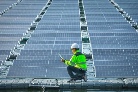 Portrait of professional man engineer working checking the panel Stock Photos