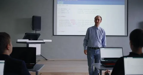 Portrait Of Professional Programmer Man Teaching School Students In School Stock Footage 280640766