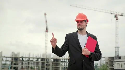 Portrait of professional worker working at construction site Stock Photos