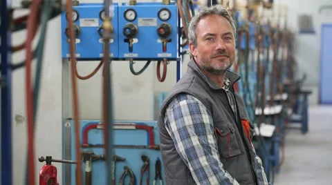 Portrait of pumber standing in workshop Video stock 51565032