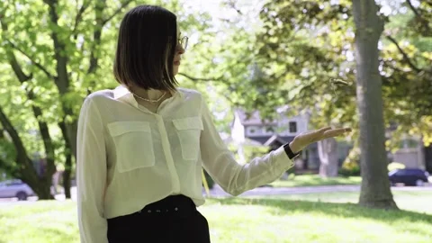 Portrait of Realtor throwing keys. Real estate agent posing with keys from house Stock Footage 244246851