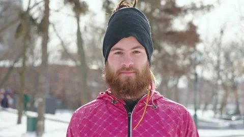Portrait of red-haired bearded man in winter park Stock Footage 157155485