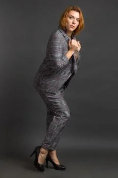 Portrait of a redhead in a Studio with on a dark background. Stock Photos