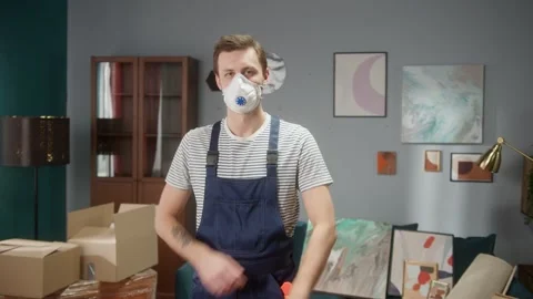 Portrait of repairman worker, man preparing to move boxes and build furniture in Stock Footage 150428699