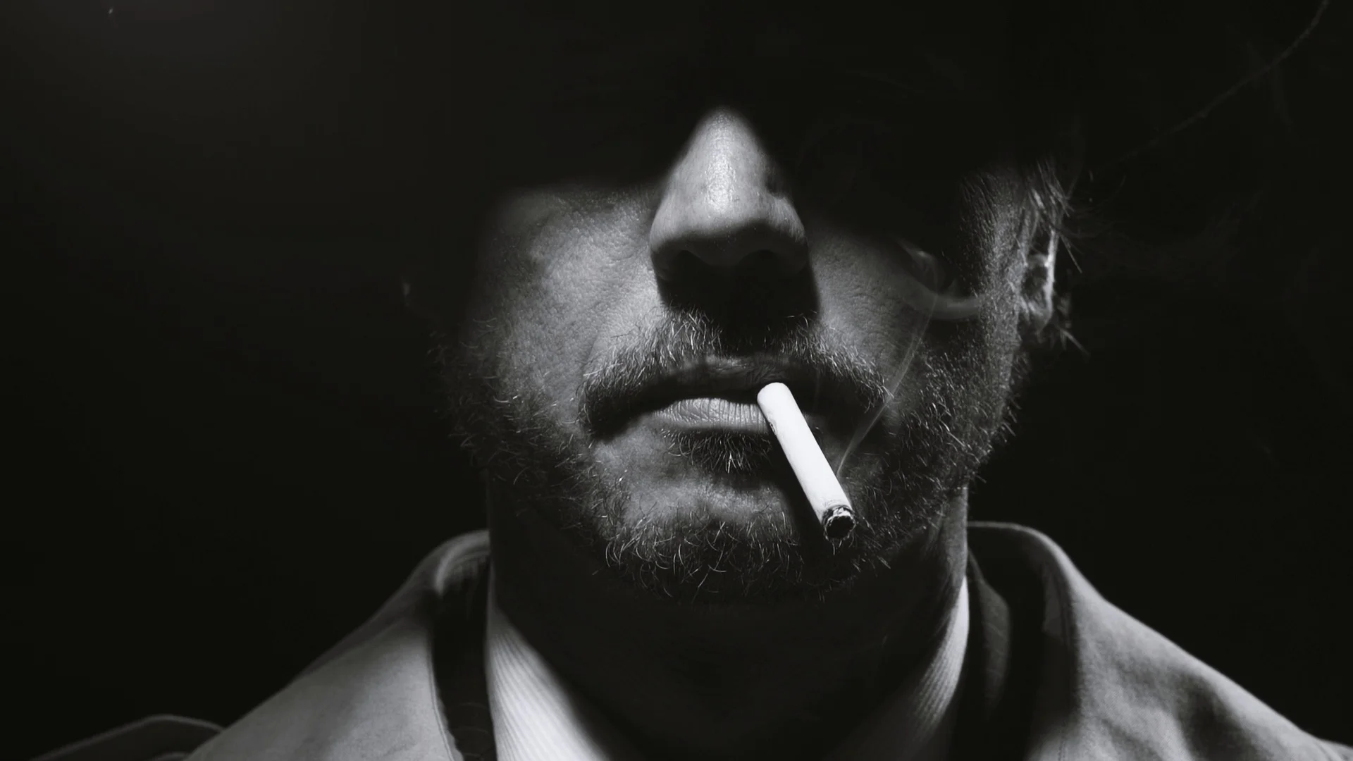 cigarette noir Portrait of a retro noir detective smoking a cigarette