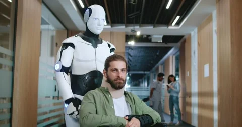 Portrait of robot assistant working at hospital helping patient standing with Stock Footage 256171314