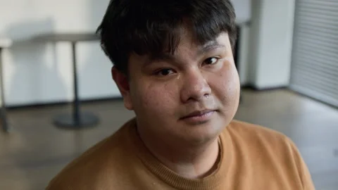 Portrait of Sad Asian Man Crying during Mental Health Therapy Session Stock Footage 337234543