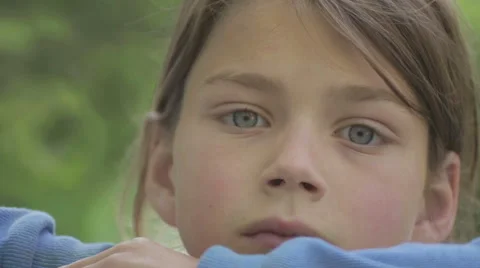Portrait of sad child looking at the camera. Video stock 63136756