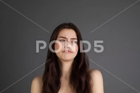 Portrait of saddend girl showing hurt and sadness, looking sad Stock Photos